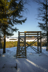Viewing platform on top of Aurinkovuori hill in winter. Vaaksy, Finland.