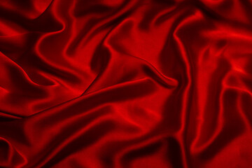 Fototapeta na wymiar Red silk or satin luxury fabric texture can use as abstract background.