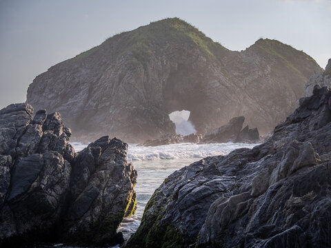 Waves breaking over the rocks