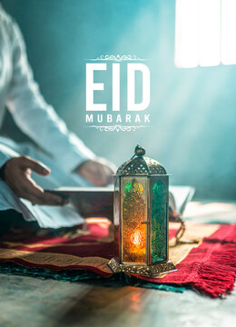 Eid Mubarak photography, Colourful lantern lamp and Muslim person praying with Quran on the background
