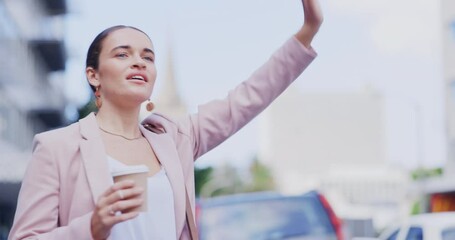 City, travel and a woman hailing a taxi while commuting outdoor for transport on a street in the day. Commute, traffic and a female waving at a cab while drinking coffee on the road of an urban town