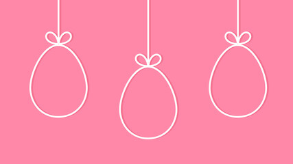 Easter eggs hanging decoration on pink background.