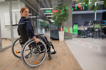 Obraz premium Caucasian woman in a wheelchair works in the office. HUD menu. Stock charts. brokerage terminal. 