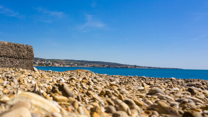 Bottom view of the coast and the sea on the horizon.