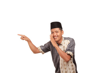 A mature man wearing sturdy clothes with a pleased expression pointed to the right. isolated white. clippingpath