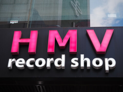 TOKYO, JAPAN - March 29, 2023: Sign on the front of HMV Record Shop in Tokyo's Shibuya area.