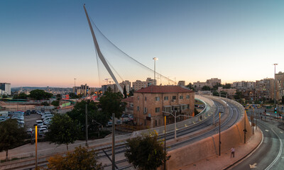 Jerusalem, Israel - August 23, 2020:  Chords Bridge. Modern bridge for tram rails and pedestrians