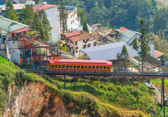 Fototapeta premium Beautiful landscape with mountain view on the train while going to Fansipan mountain in Sapa city, Vietnam