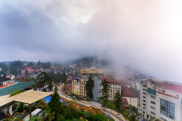 Aerial view of landscape at the hill town in Sapa city, Lao Cai Province, Vietnam in Asia with misty and foggy