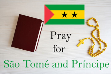 Pray for Sao Tome and Principe. Rosary and Holy Bible background.