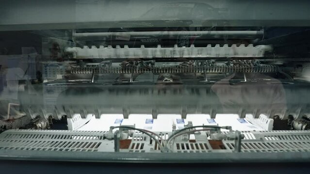 Printing house. Paper submission. Offset printing process.
