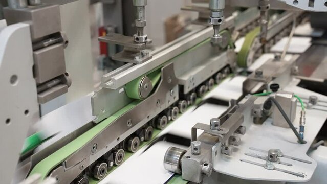 Printing house. Paper submission. Offset printing process.