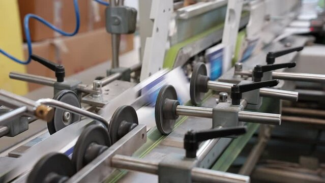 Paper submission. Printing house. Offset printing process. Perforation of printed paper. Paper creasing