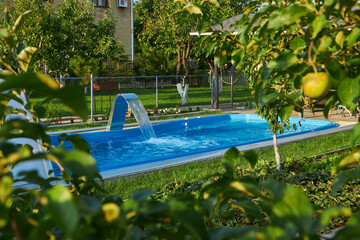 swimming pool with view of the garden