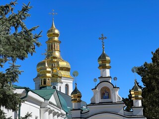 Fototapeta na wymiar Kyiv Lavra Cave monastery gate to Church Exaltation of the Cross.