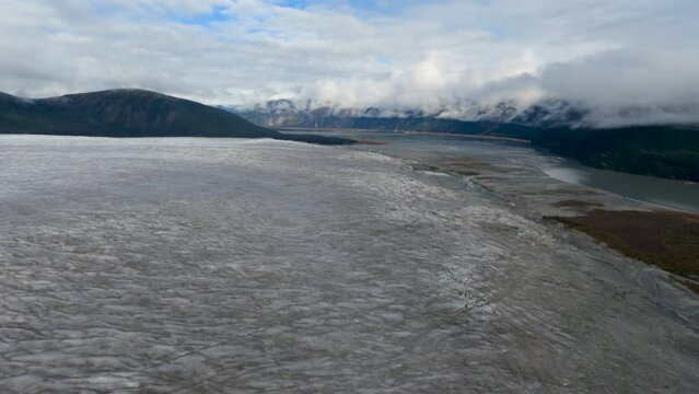Where the Taku Glacier Meets Taku River Aerial View Flying Above Glacial Ice Field