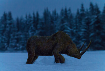 the figure of a rhinoceros on a winter evening on the field