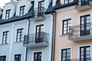Fototapeta na wymiar colored multi-storey houses close-up