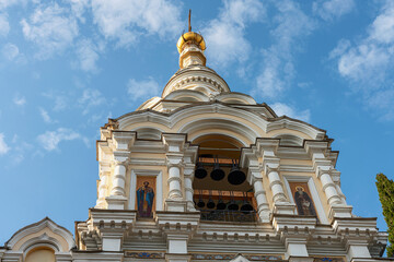 bottom view of a fragment of the cathedral in the Russian northern city of St. Petersburg on the  blue summer sky background - 587075578