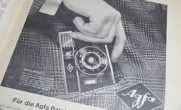 Viersen, Germany - March 9. 2023: Closeup of Agfa parat pocket camera advertising in german paper magazin from 60s