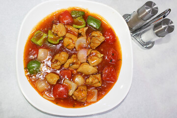 Chicken Manchurian, Chicken Breasts, Bell Pepper, Tomatoes, Soy Sauce. 
