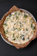 Delicious quiche with broccoli, cheese, chicken, spices and herbs