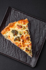 Delicious quiche with broccoli, cheese, chicken, spices and herbs