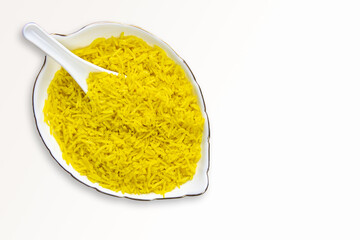 yellow basmati rice in a white Bowl, a traditional Indian and Arabic dish, isolated on white background top view
