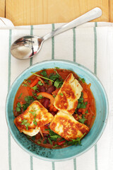 Bean stew with grilled halloumi