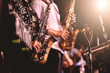 Musical instruments ,Saxophone Player hands Saxophonist playing jazz music. Alto sax musical instrument closeup