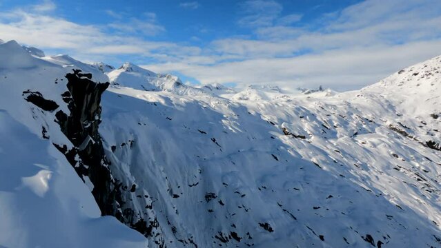 Sun-Kissed Flight Soaring Over Juneau's Mighty Taku Glacier and Mountains