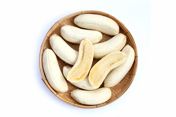 Banana in bamboo weave plate on white background.