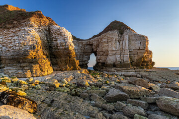 Thornwick Nab is an impressive sea stack and arch at Thornwick Bay on the Yorkshire Coast. Taken at sunrise.