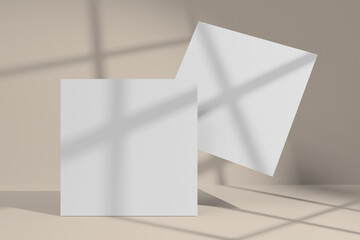 Mockup of two square greeting cards with window shadow overlay