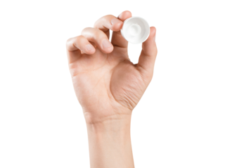 Hand holding a plastic cap, cut out