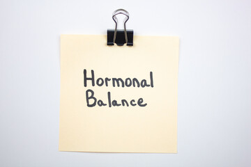 HORMONAL BALANCE text on paper.Medical concept hormonal balance.