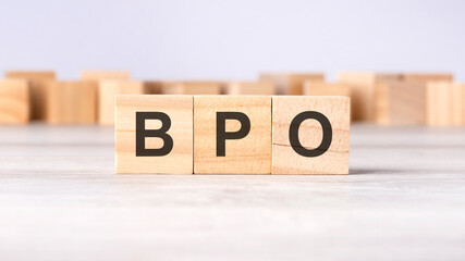 BPO - word concept written on wooden cubes or blocks on a light background