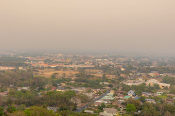 Overview of downtown with bad visibility, Smog or dust PM 2.5 (Particulate matter with diameter of less than 2.5 micron) Bad weather and dangerous air pollution in northern of Thailand, Nan province.