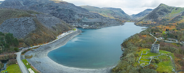 Beautiful turquoise waters of Llyn Peris Lake in Wales. Wide panoramic aerial view. High quality photo