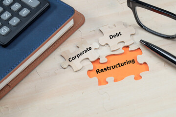 Corporate Debt Restructuring concept. Message on Corporate Debt Restructuring message written on the missing jigsaw puzzles 