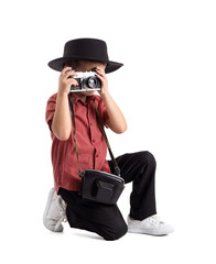 Cute little photographer with camera on white background