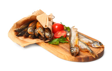 Board with delicious smoked capelin wrapped in parchment isolated on white background