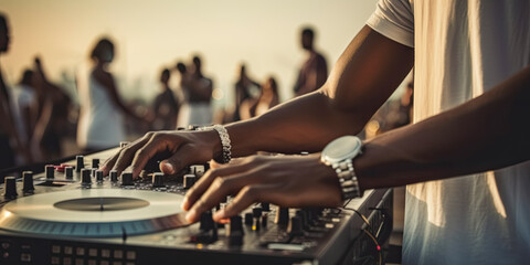 Party on the beach. Dj mixing outdoor at beach party festival with crowd of people in background. Disc jockey playing music on beach.  Event, music and fun concept - obrazy, fototapety, plakaty