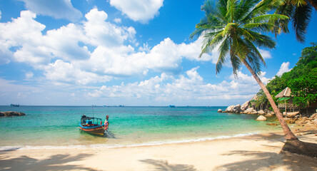 Naklejka na ściany i meble Tropical beach with coconut palm and longtail boat