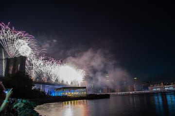 USA, New York, July: Fireworks during the celebration independence day in the USA. People are...