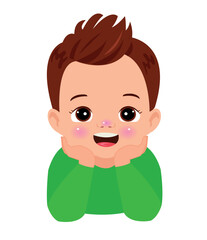 Portrait of a cute little boy with a green shirt.