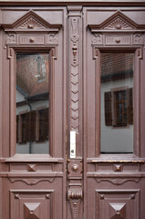 View of ornate wooden door in city