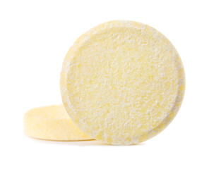 Yellow soluble tablets isolated on white background