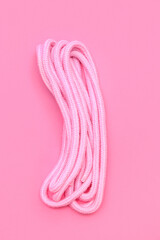 Rope from sex shop on pink background