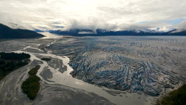 Aerial Magic Blue Ice Crevasses Adorn Taku Glacier at The River Headwaters, Alaska